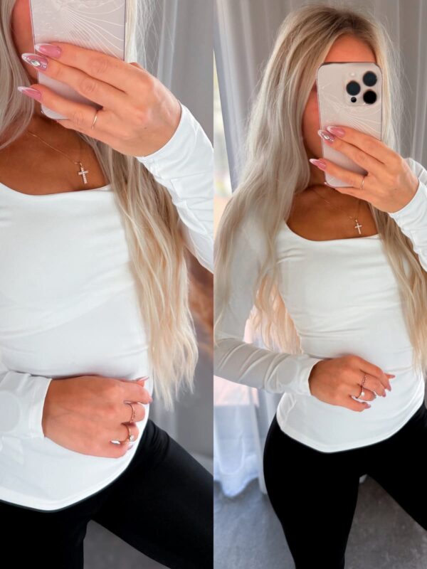 Valge pikkade varrukatega pluus