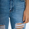 Helesinised skinny stretch teksapüksid naistele - kulutatud disain